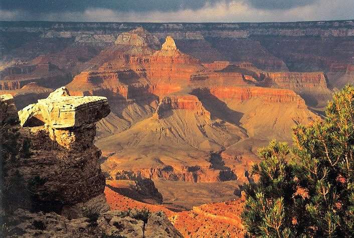 Grand Canyon Tour guests often see distant rainclouds